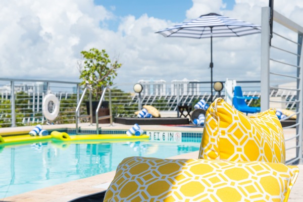 2 outdoor pools, open 8 AM to 8 PM, free cabanas, pool umbrellas