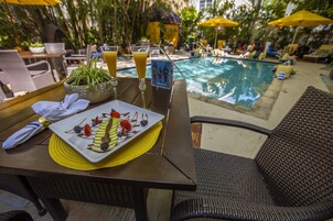 2 outdoor pools, open 8 AM to 8 PM, free cabanas, pool umbrellas