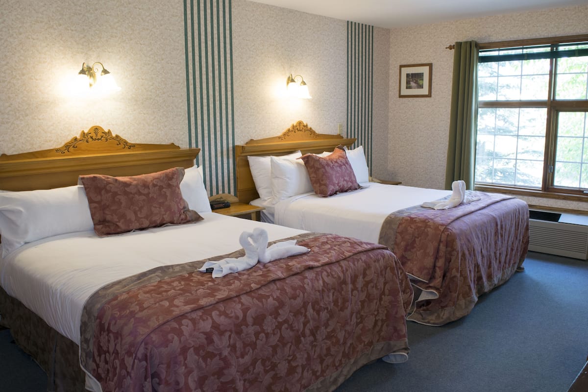 Room, 2 Queen Beds | Individually decorated, individually furnished, iron/ironing board