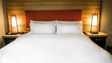 Suite, 1 Bedroom | Desk, blackout drapes, iron/ironing board, free WiFi