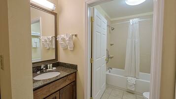 Hair dryer, towels, soap, shampoo