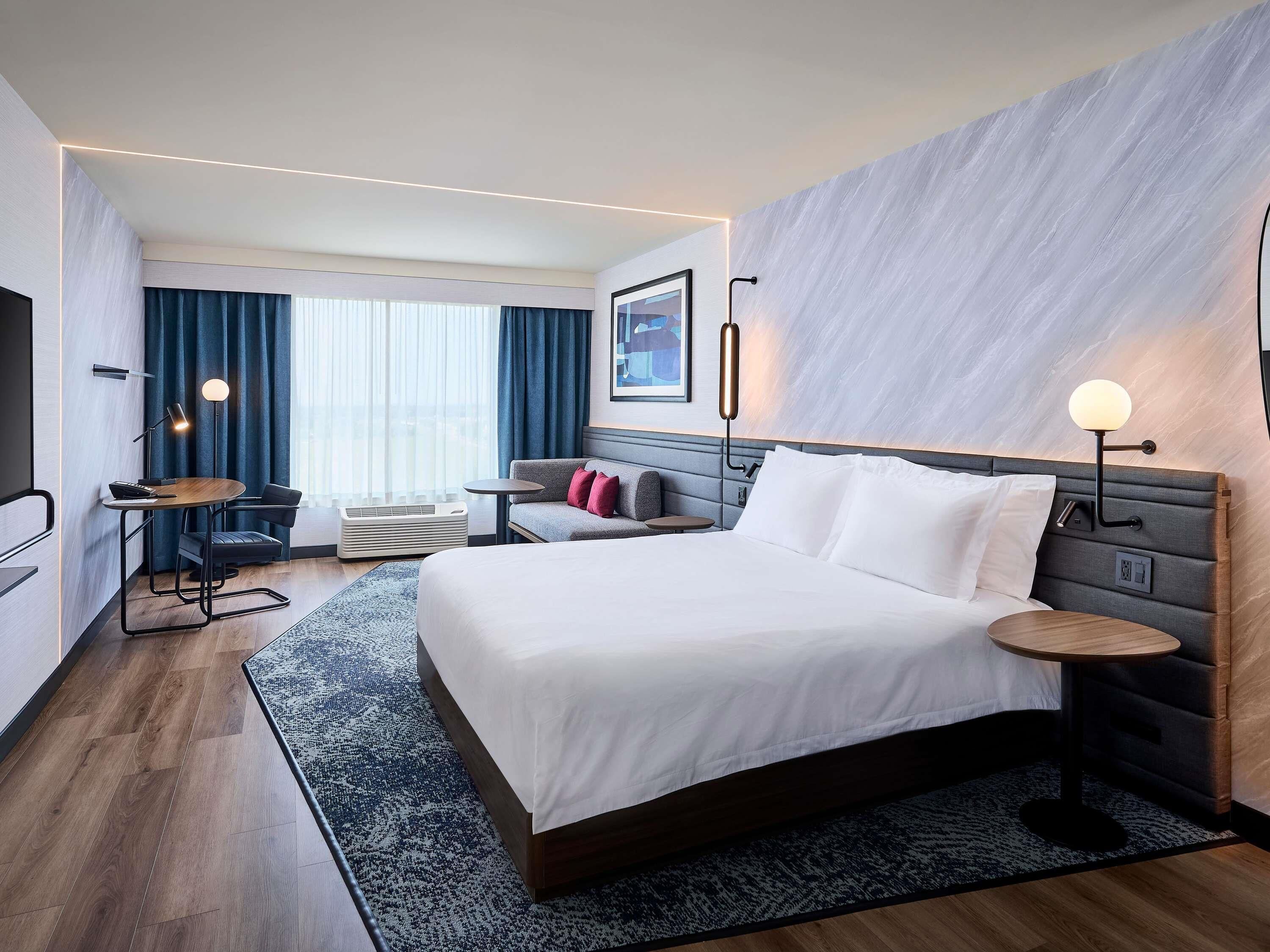 Down duvets, pillow-top beds, in-room safe, desk