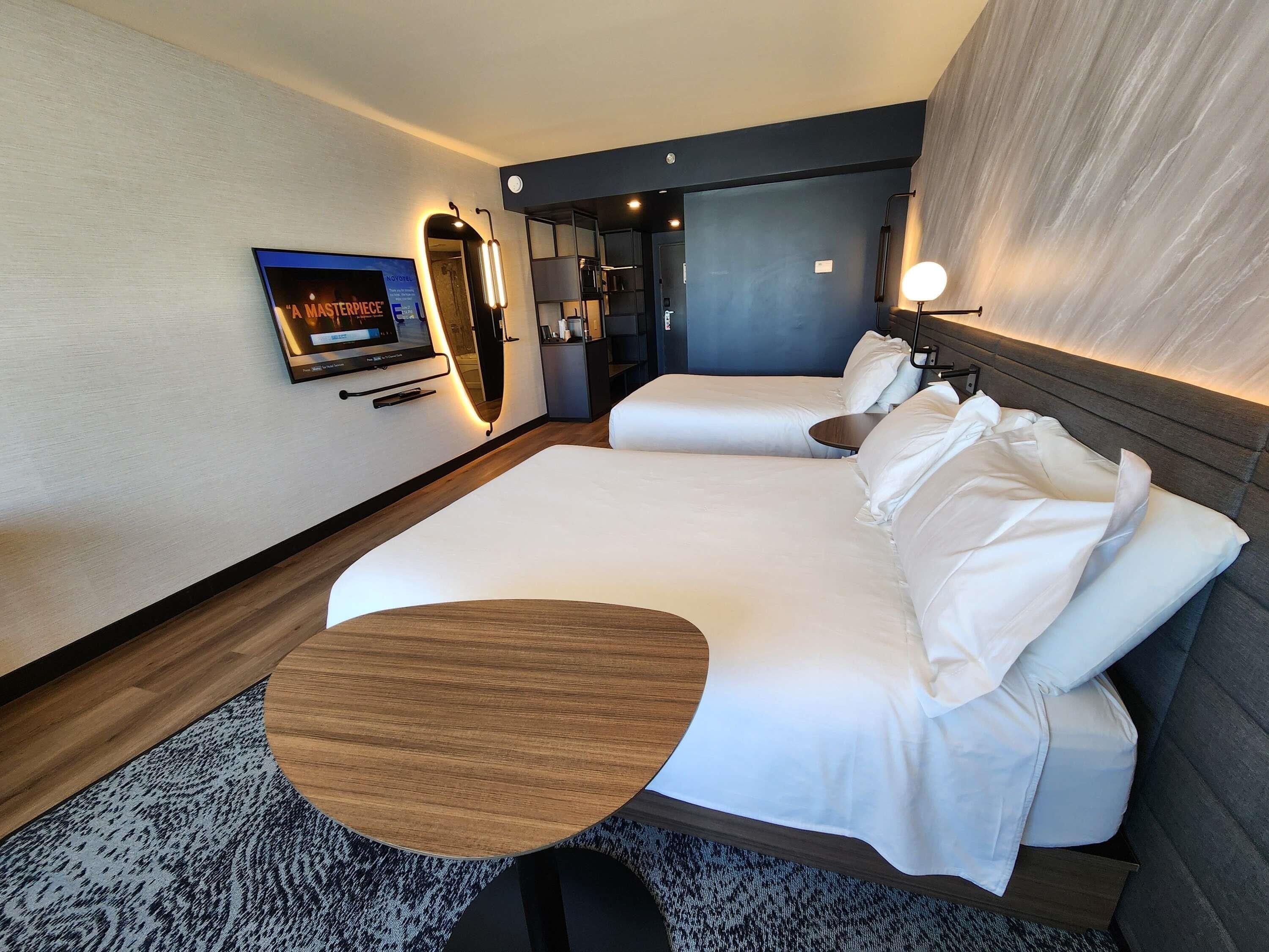 Down duvets, pillow-top beds, in-room safe, desk