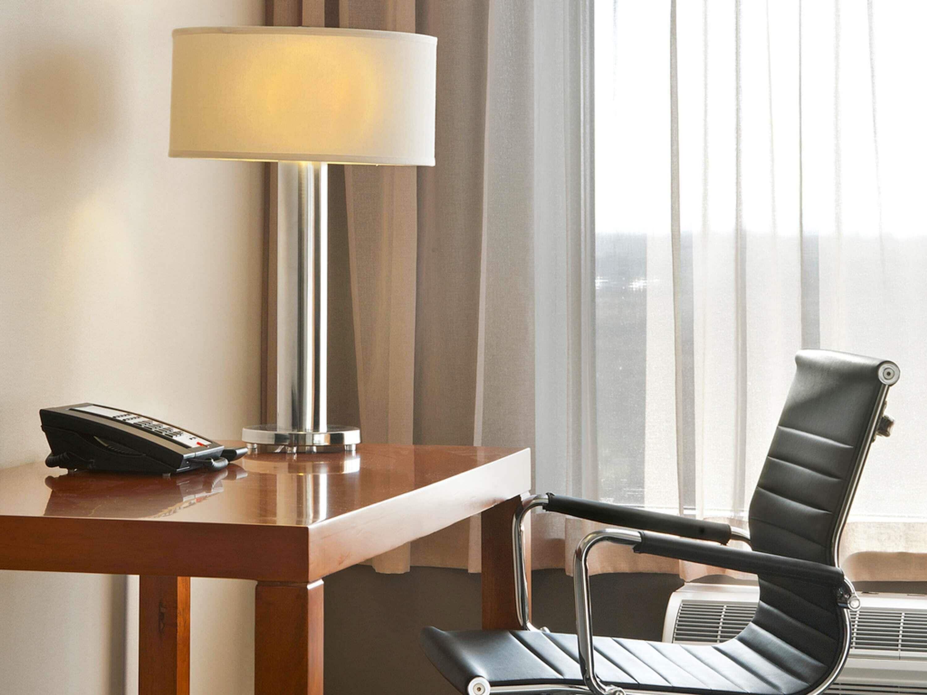 Down comforters, pillowtop beds, in-room safe, desk