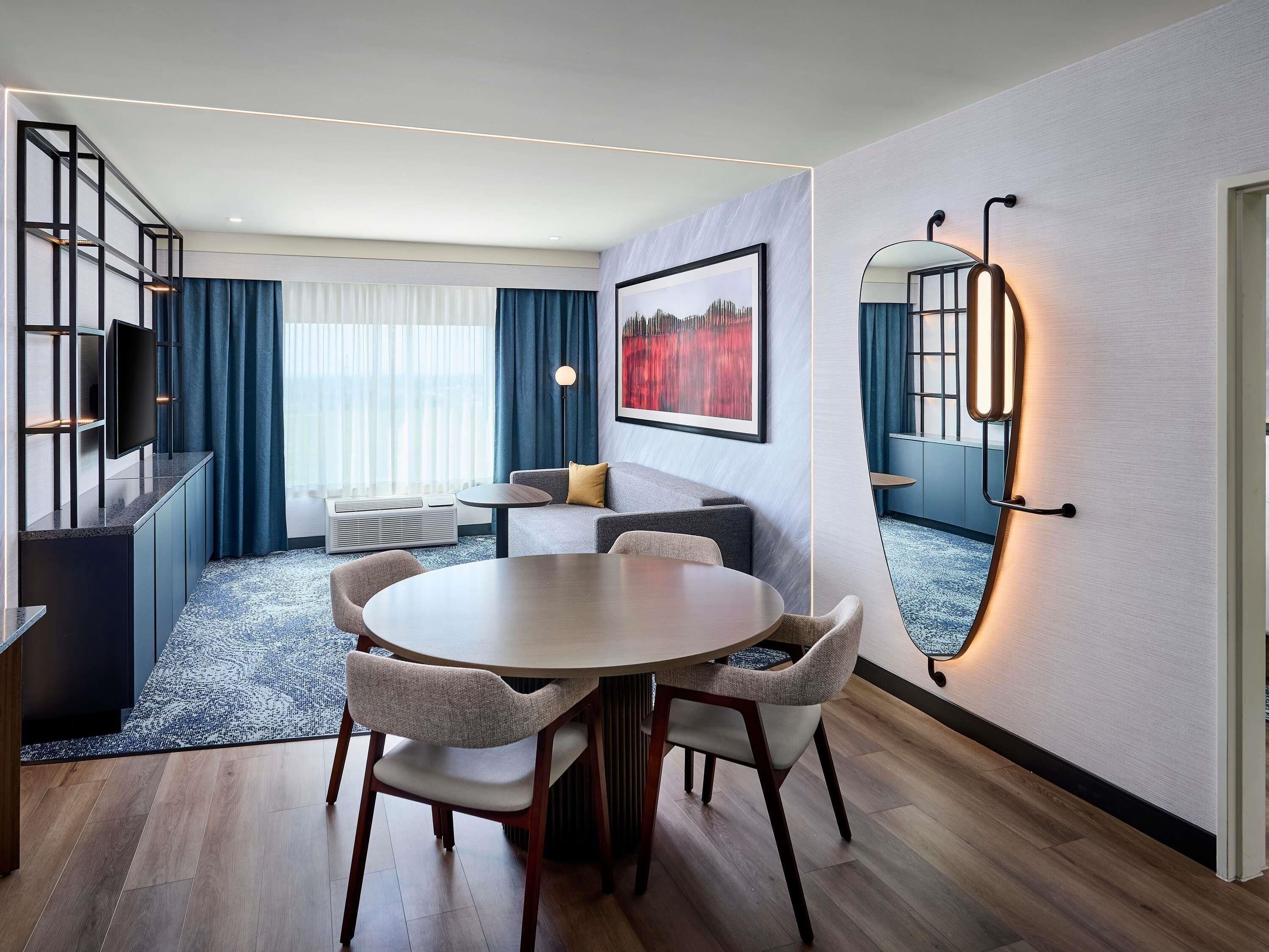 Down duvets, pillow-top beds, in-room safe, desk