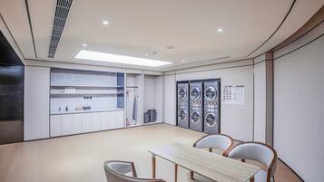 Premium bedding, down comforters, minibar, in-room safe