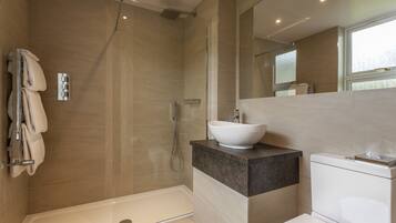 Standard Double Room | Bathroom | Designer toiletries, hair dryer, bathrobes, slippers