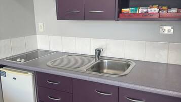 Fridge, microwave, coffee/tea maker, electric kettle