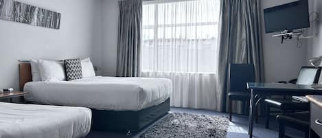 Premium bedding, in-room safe, individually decorated