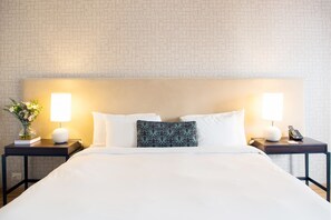 Habitación superior | Ropa de cama de alta calidad y edredones de plumas