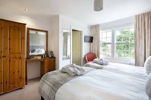 Standard Room | Desk, iron/ironing board, free cots/infant beds, bed sheets