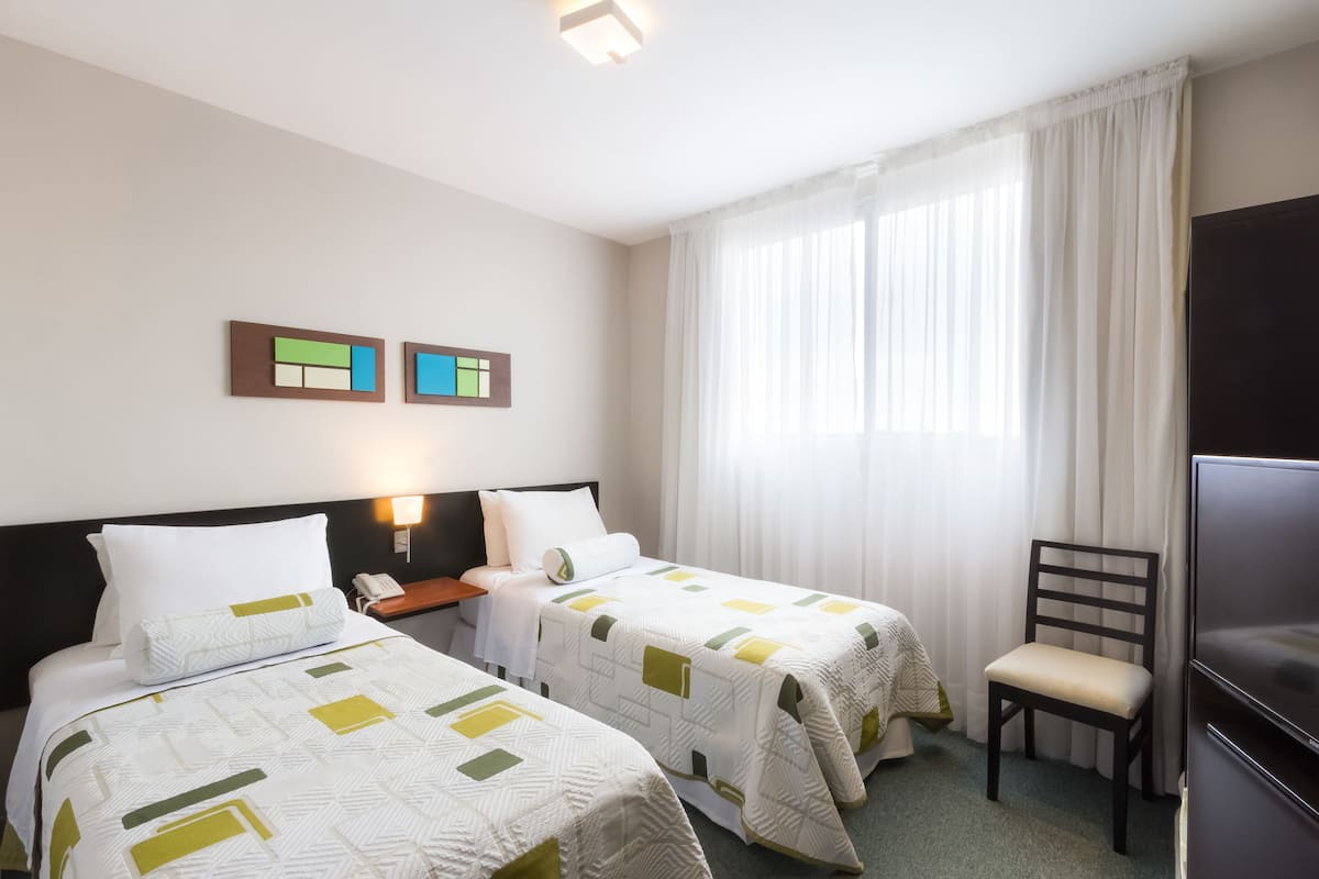 Superior Twin Room | Minibar, in-room safe, blackout drapes, free WiFi