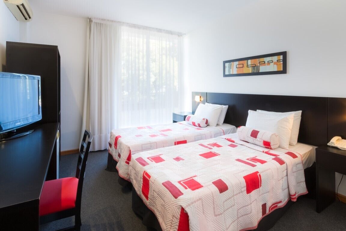 superior twin room | minibar, in-room safe, desk, free wifi