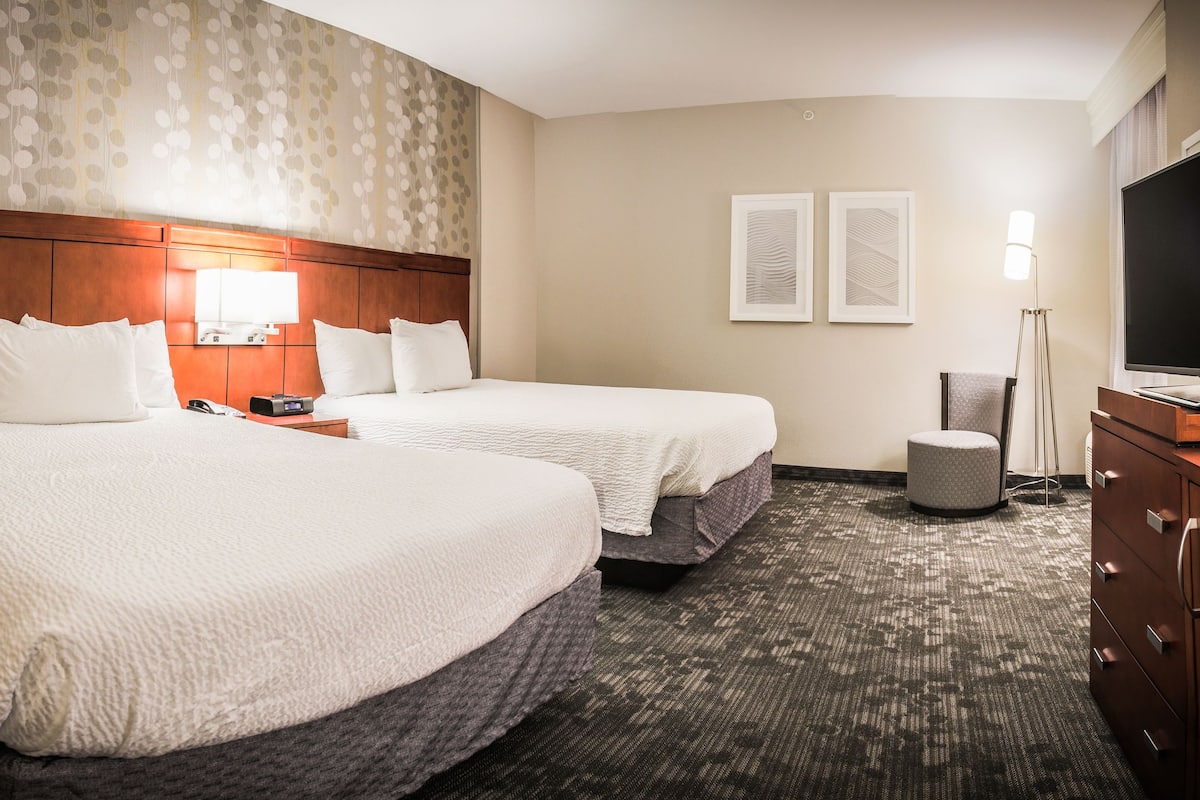 premium bedding, desk, laptop workspace, blackout curtains