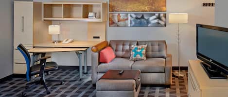 Estudio, 1 cama King size y sofá cama, para no fumadores | Área de sala de estar | Televisión de pantalla plana