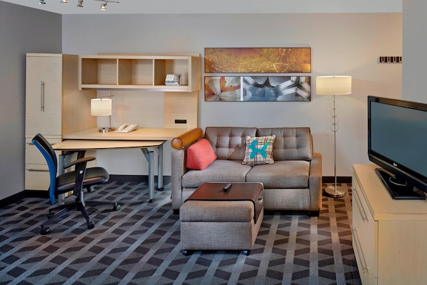 Studio, 1 King Bed with Sofa bed | Living area | Flat-screen TV