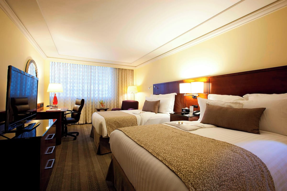 Pillow-top beds, minibar, in-room safe, desk