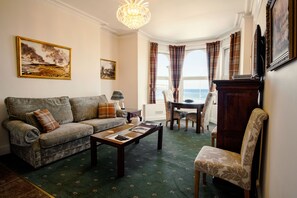 Premium Apartment, 2 Bedrooms, Sea View | Living area | Flat-screen TV, toys - The Town House (Douglas)