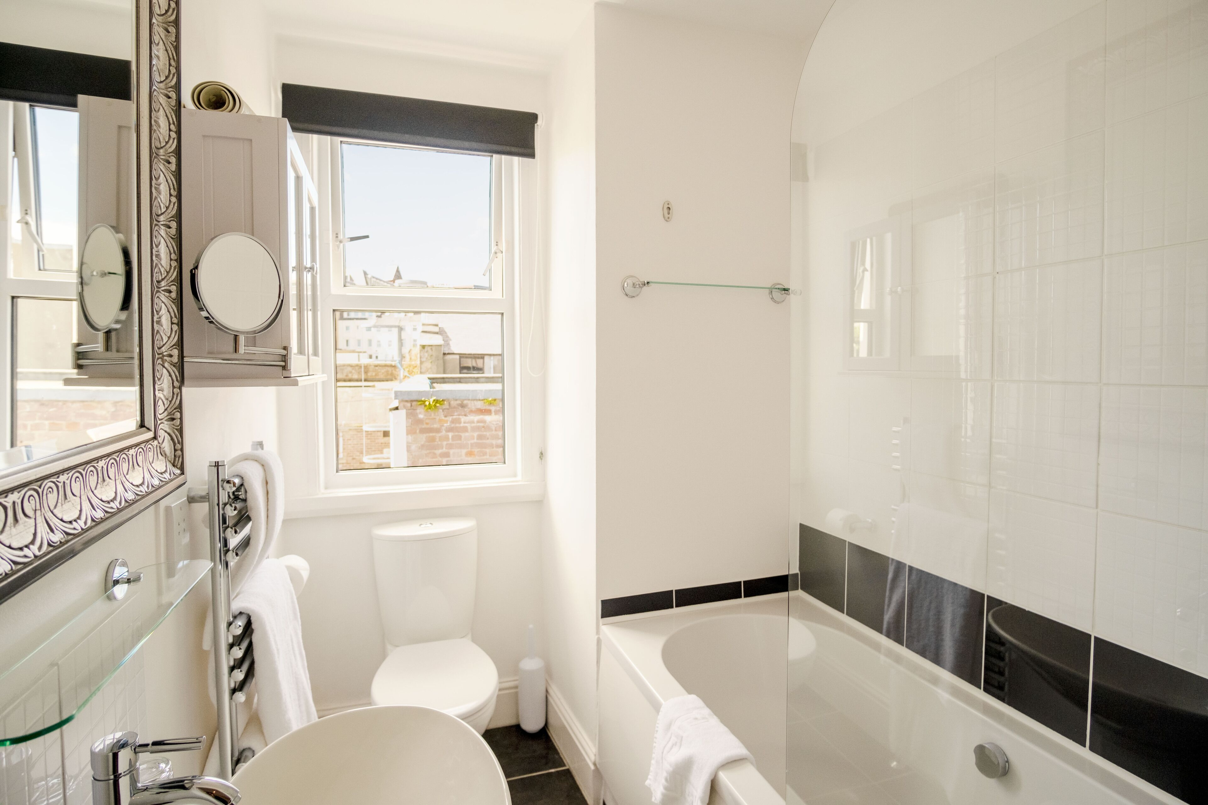 Executive Suite, 1 Bedroom | Bathroom | Shower, free toiletries, hair dryer, bathrobes