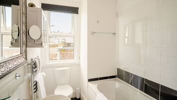 Executive Suite, 1 Bedroom | Bathroom | Shower, free toiletries, hair dryer, bathrobes
