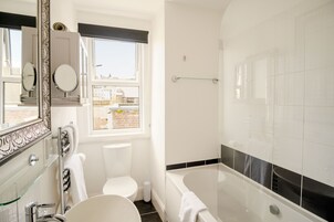 Executive Suite, 1 Bedroom | Bathroom | Shower, free toiletries, hair dryer, bathrobes