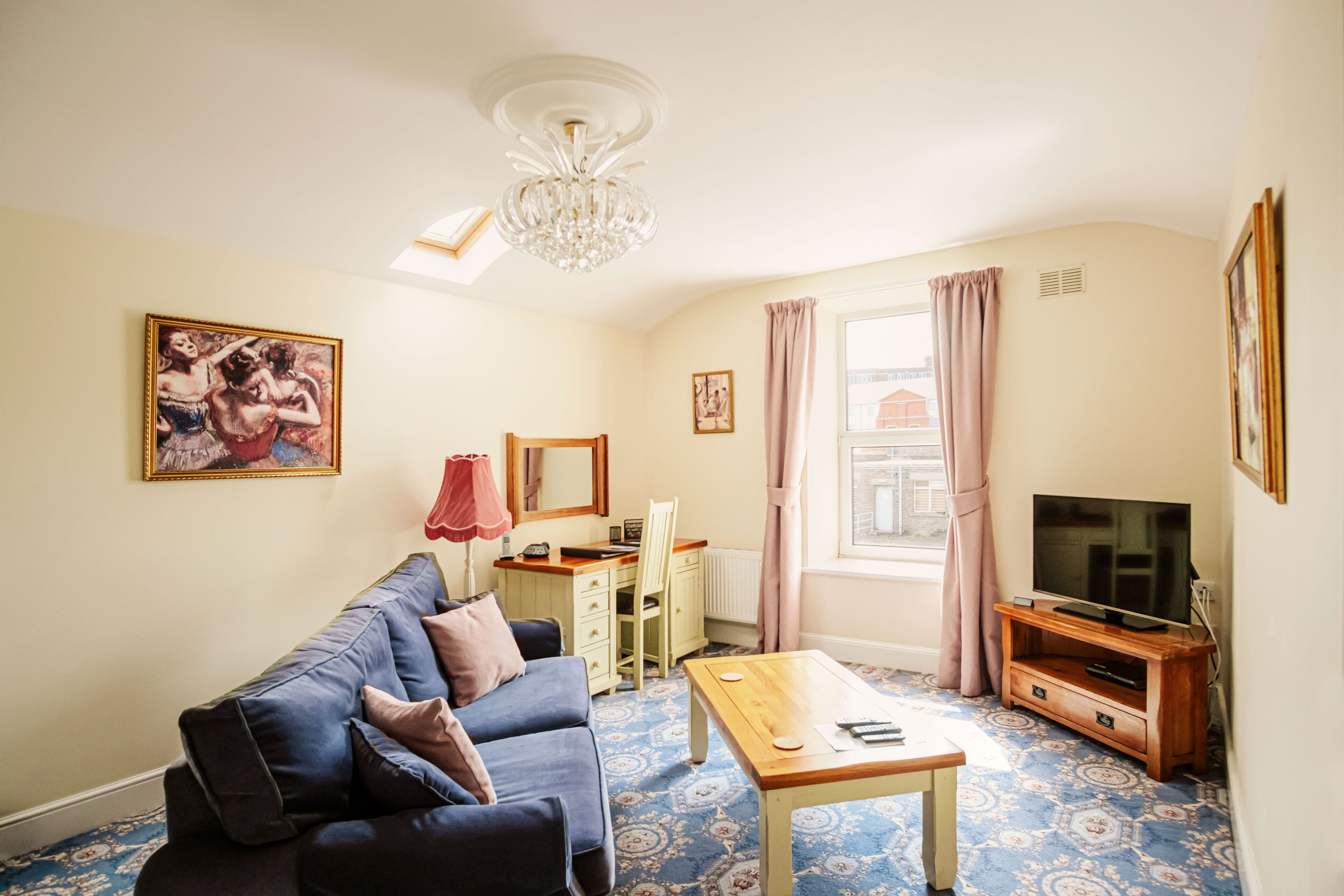 luxury apartment, 1 bedroom | living area | flat-screen tv, toys