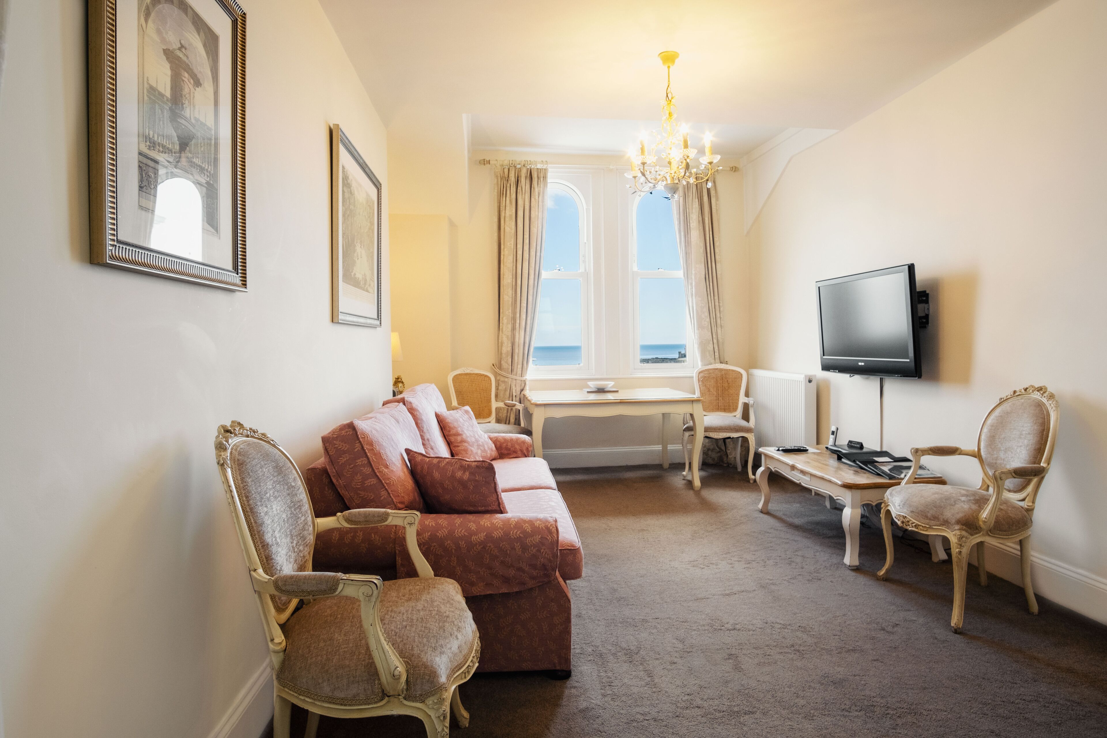 Luxury Apartment, 1 Bedroom, Sea View | Living area | Flat-screen TV, toys