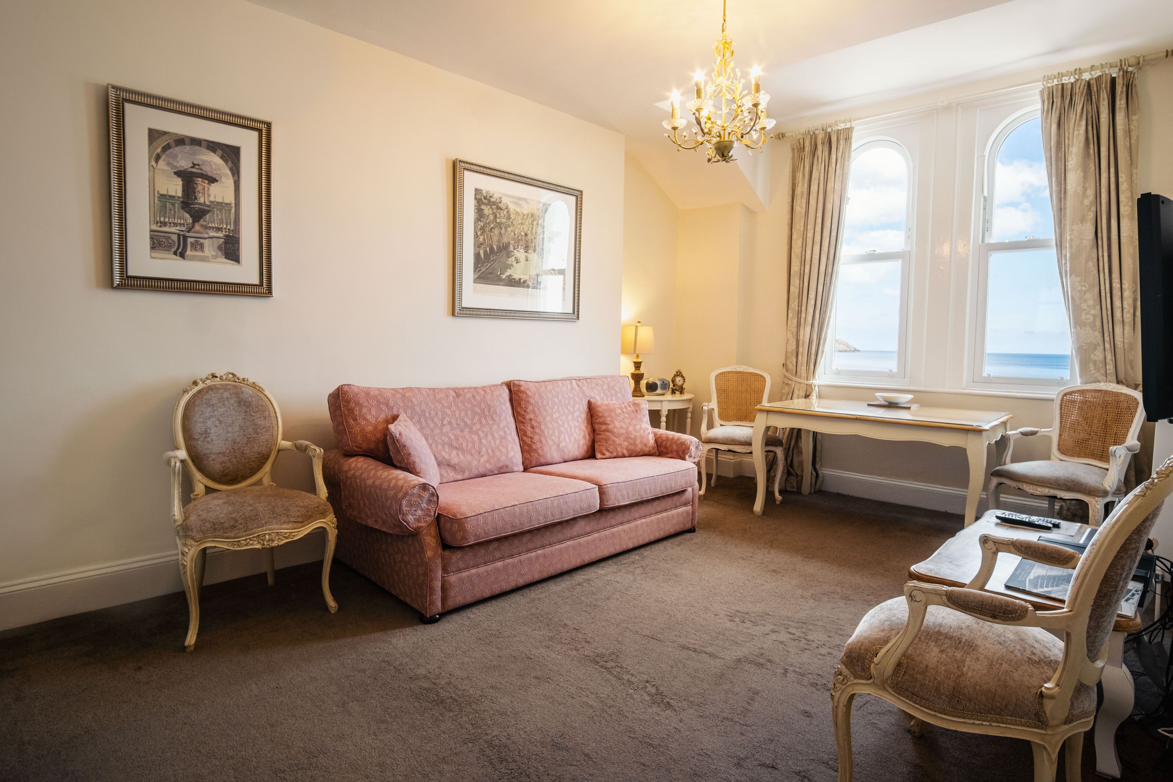 luxury apartment, 1 bedroom, sea view | living area | flat-screen tv, toys