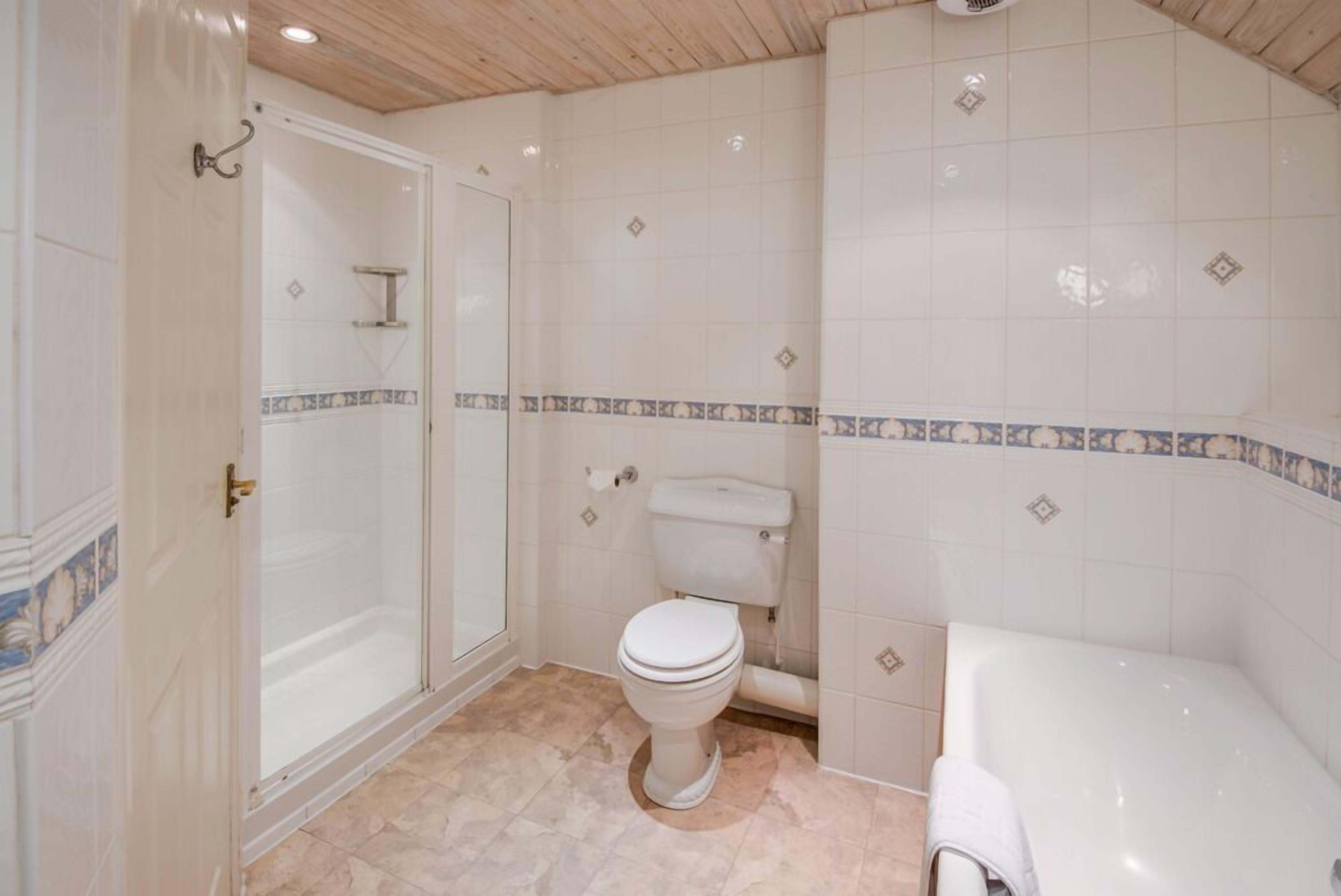 deep-soaking bathtub, free toiletries, hair dryer, towels