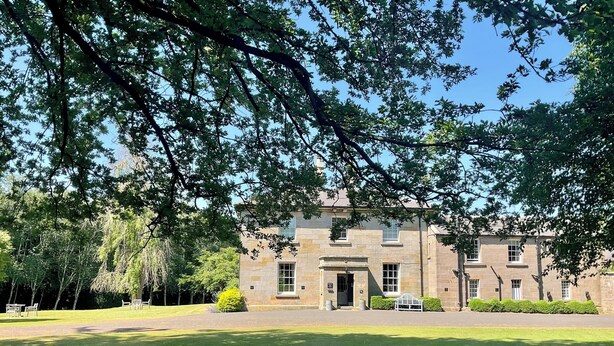 A stone building with a symmetrical facade, large windows, and a central entrance. - Chatton Park House Hotel Adult Only (Alnwick)