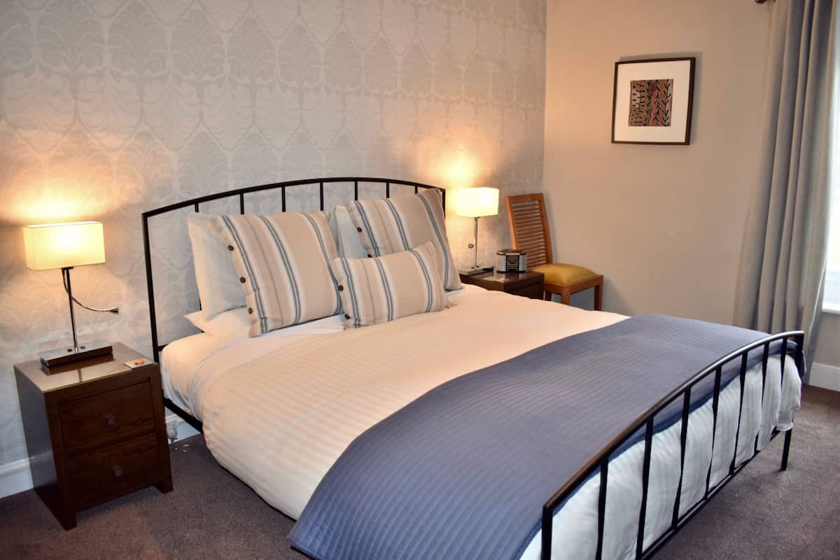 Ropa de cama de alta calidad y cortinas blackout