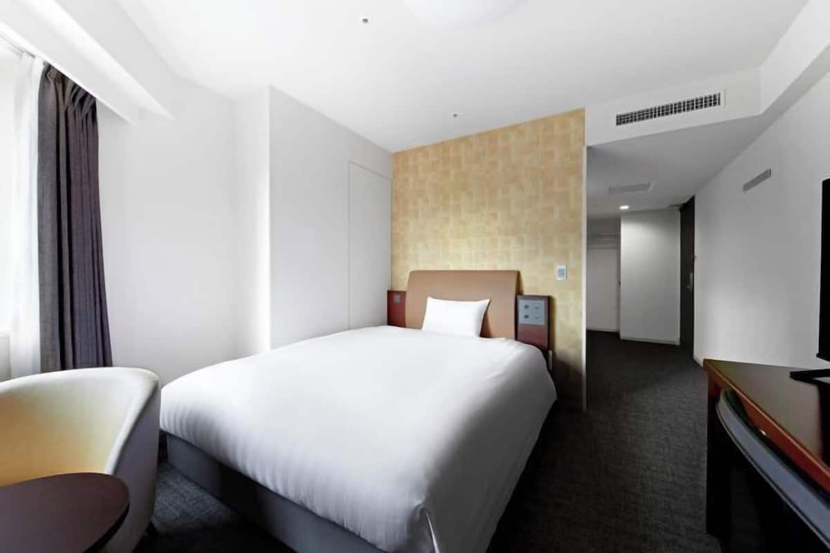 Down duvets, blackout curtains, free WiFi, bed sheets