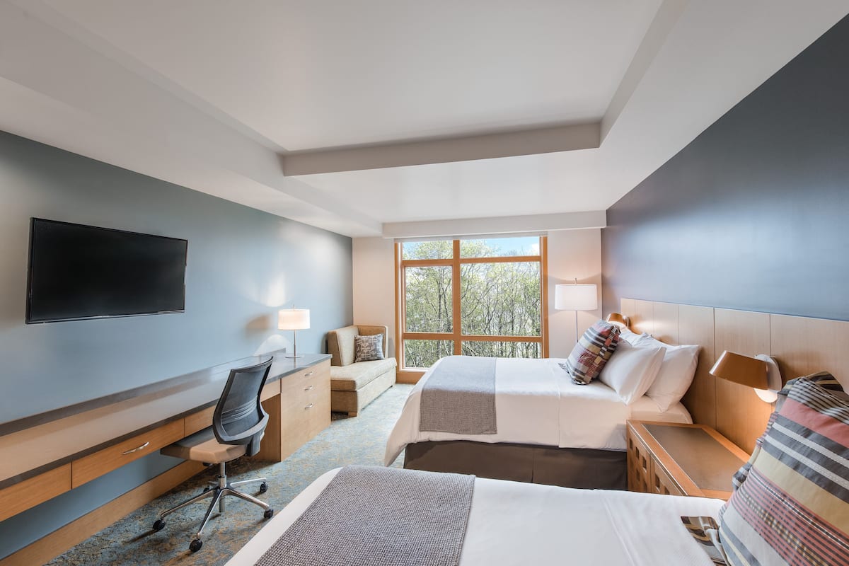Premium bedding, down duvets, in-room safe, desk