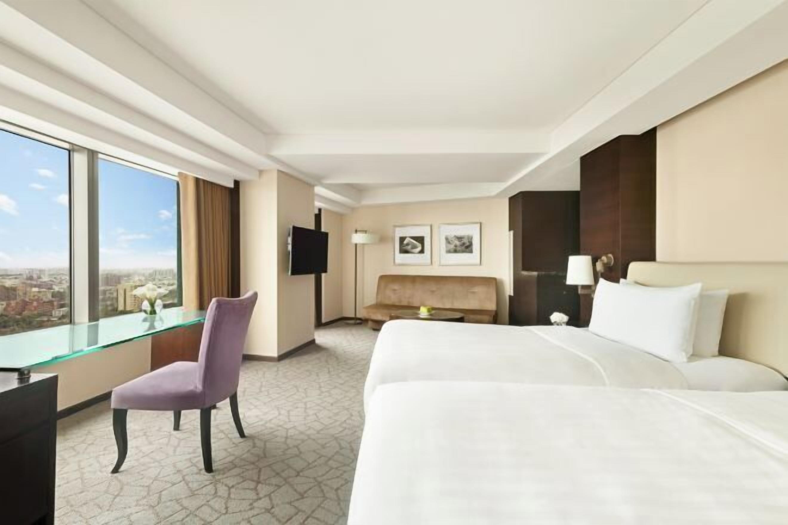 Premium bedding, down duvets, pillow-top beds, in-room safe