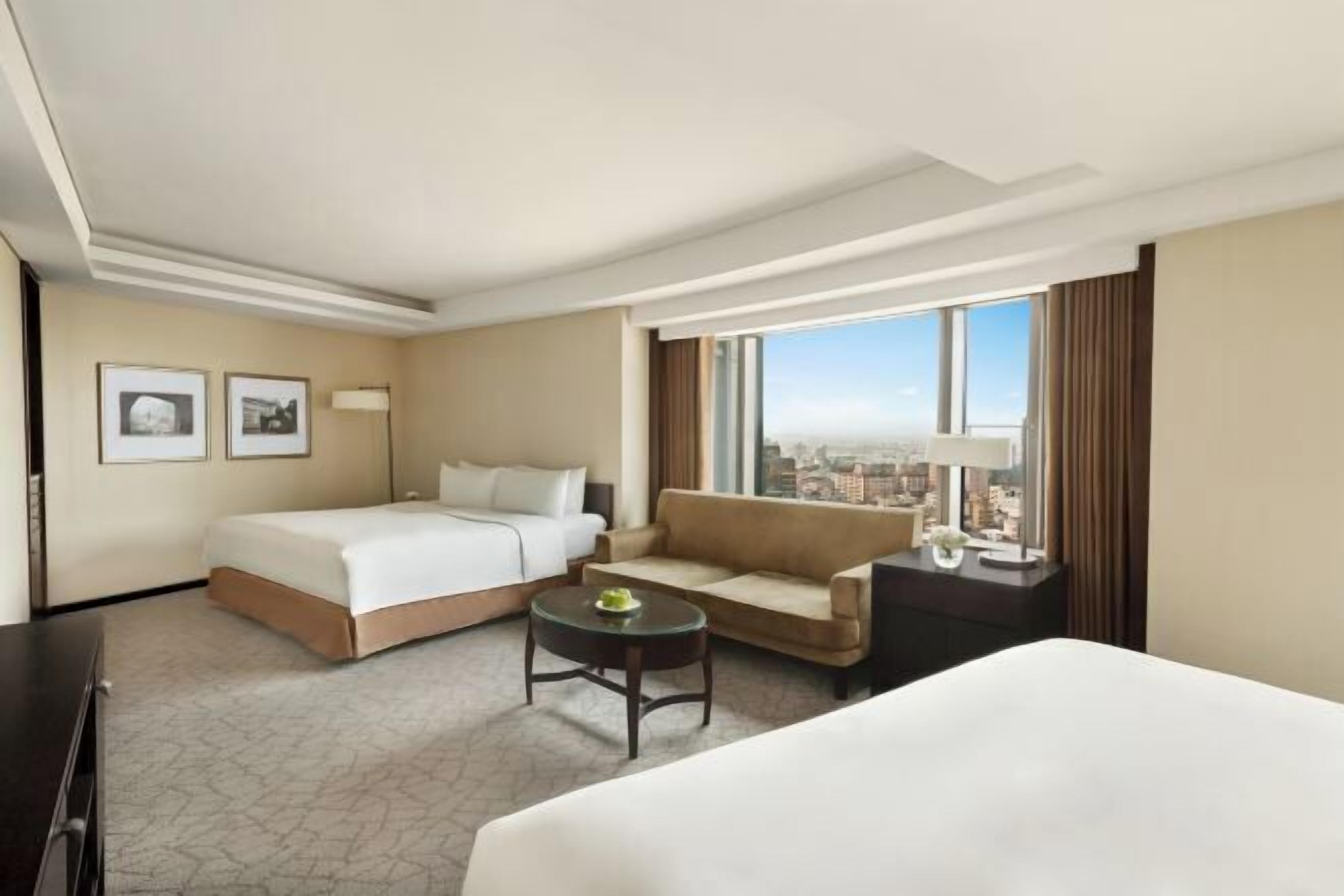 Premium bedding, down duvets, pillow-top beds, in-room safe