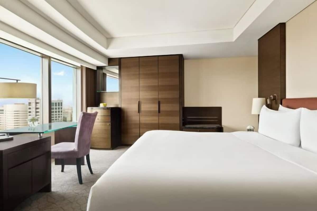 Luxe beddengoed, donsdekens, pillowtop-bedden, een kluis op de kamer