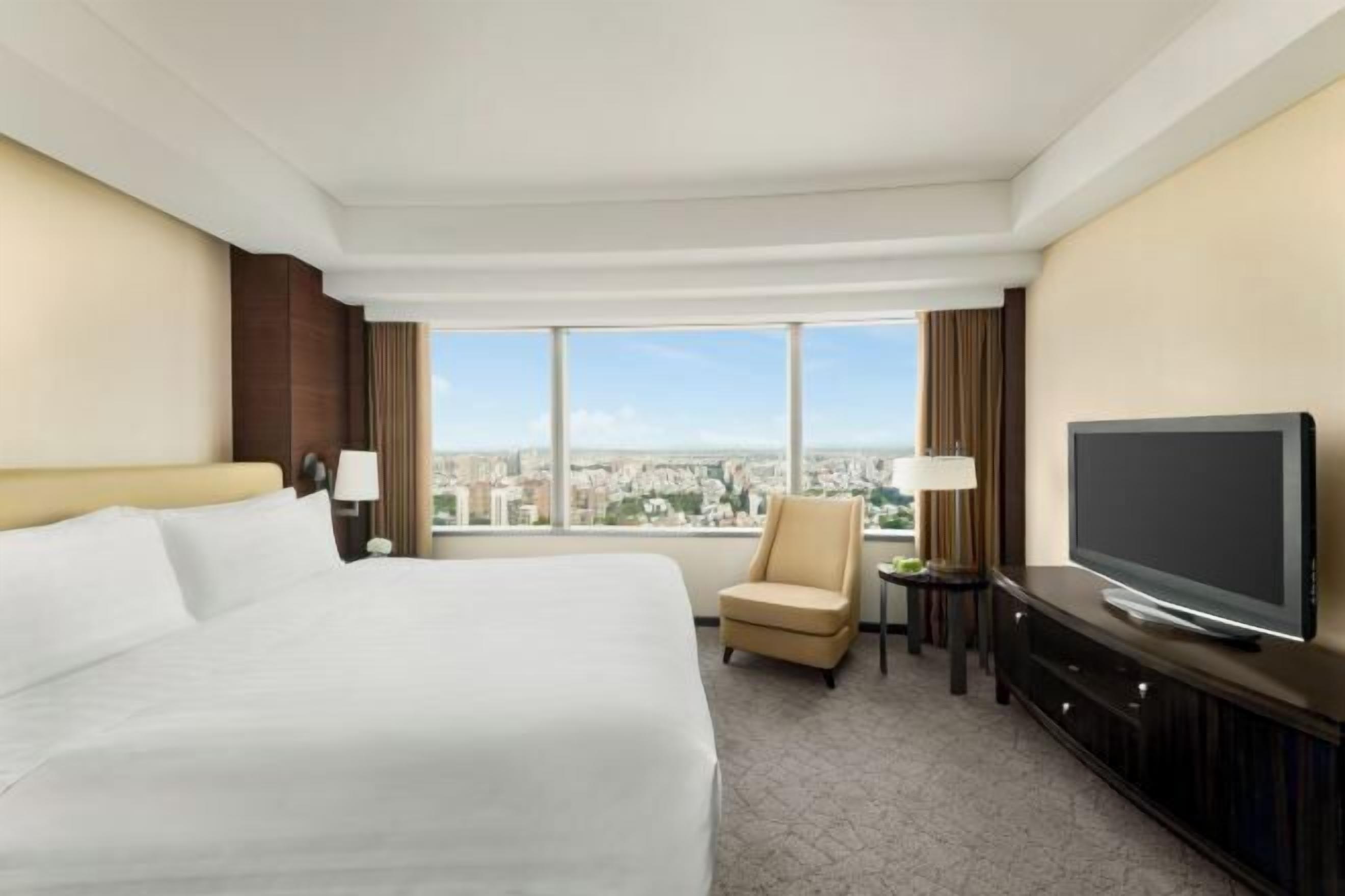 Premium bedding, down duvets, pillow-top beds, in-room safe