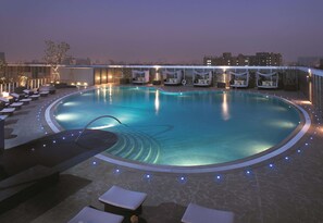 Outdoor pool, open 7:30 AM to 9:30 PM, pool umbrellas, pool loungers