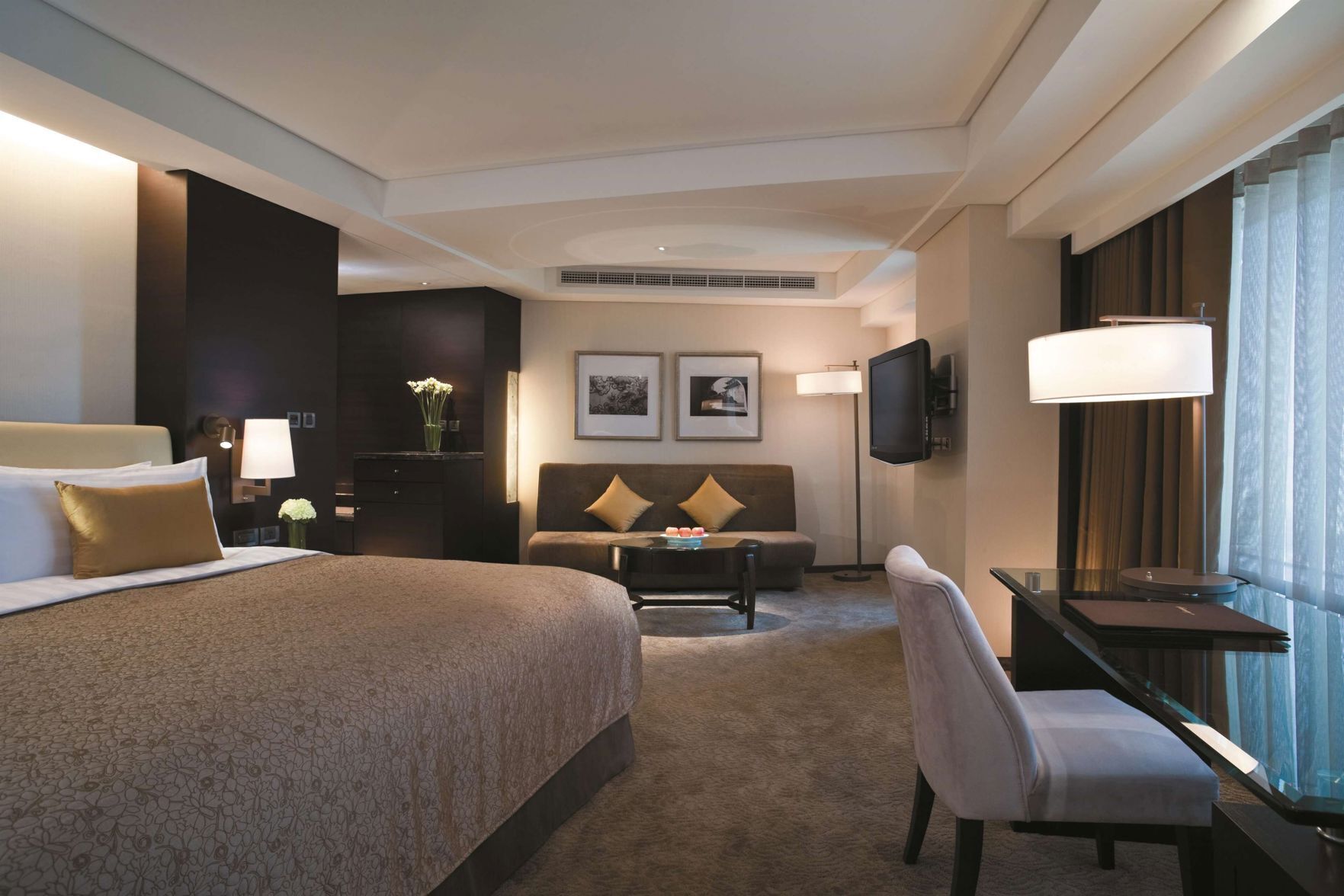 Premium bedding, down comforters, pillowtop beds, in-room safe
