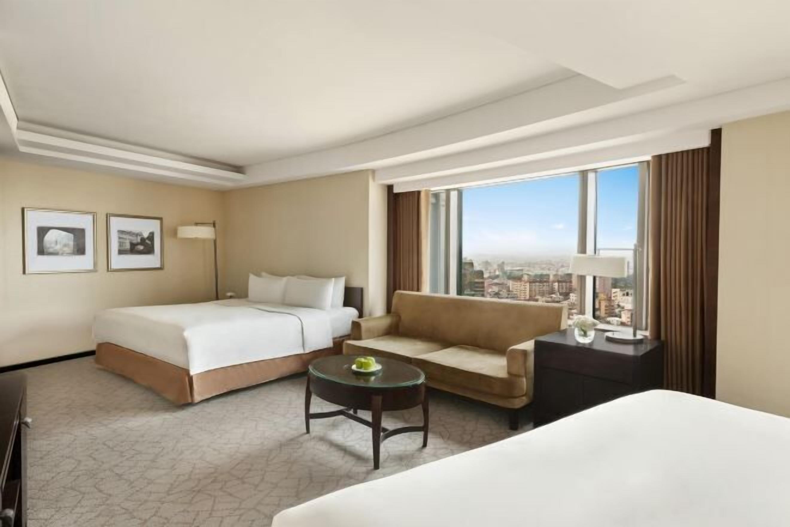 Premium bedding, down duvets, pillow-top beds, in-room safe