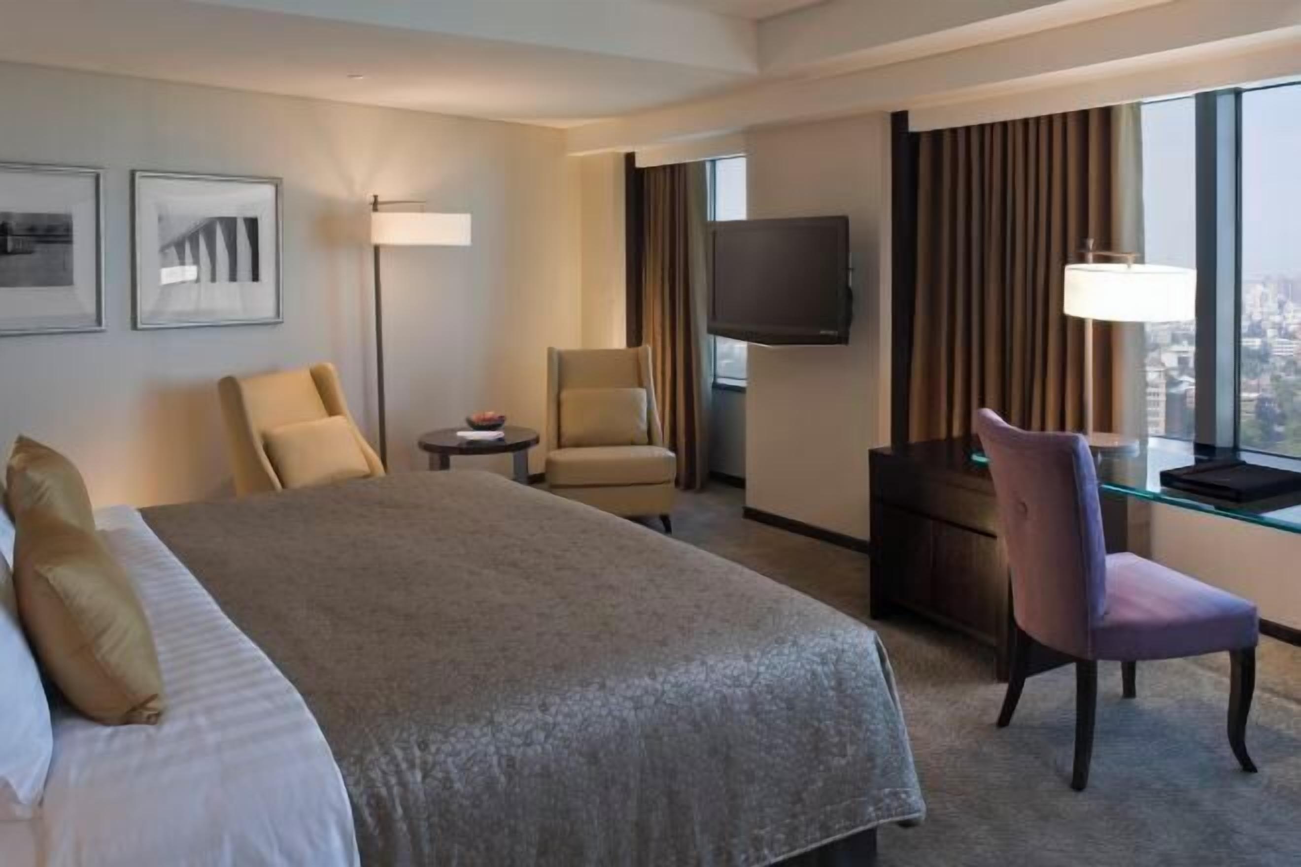 Premium bedding, down duvets, pillow-top beds, in-room safe