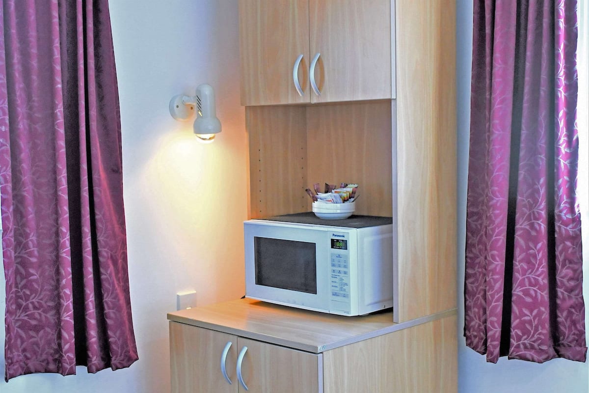 room, multiple beds, non smoking | pillow-top beds, desk, iron/ironing board, free cots/infant beds