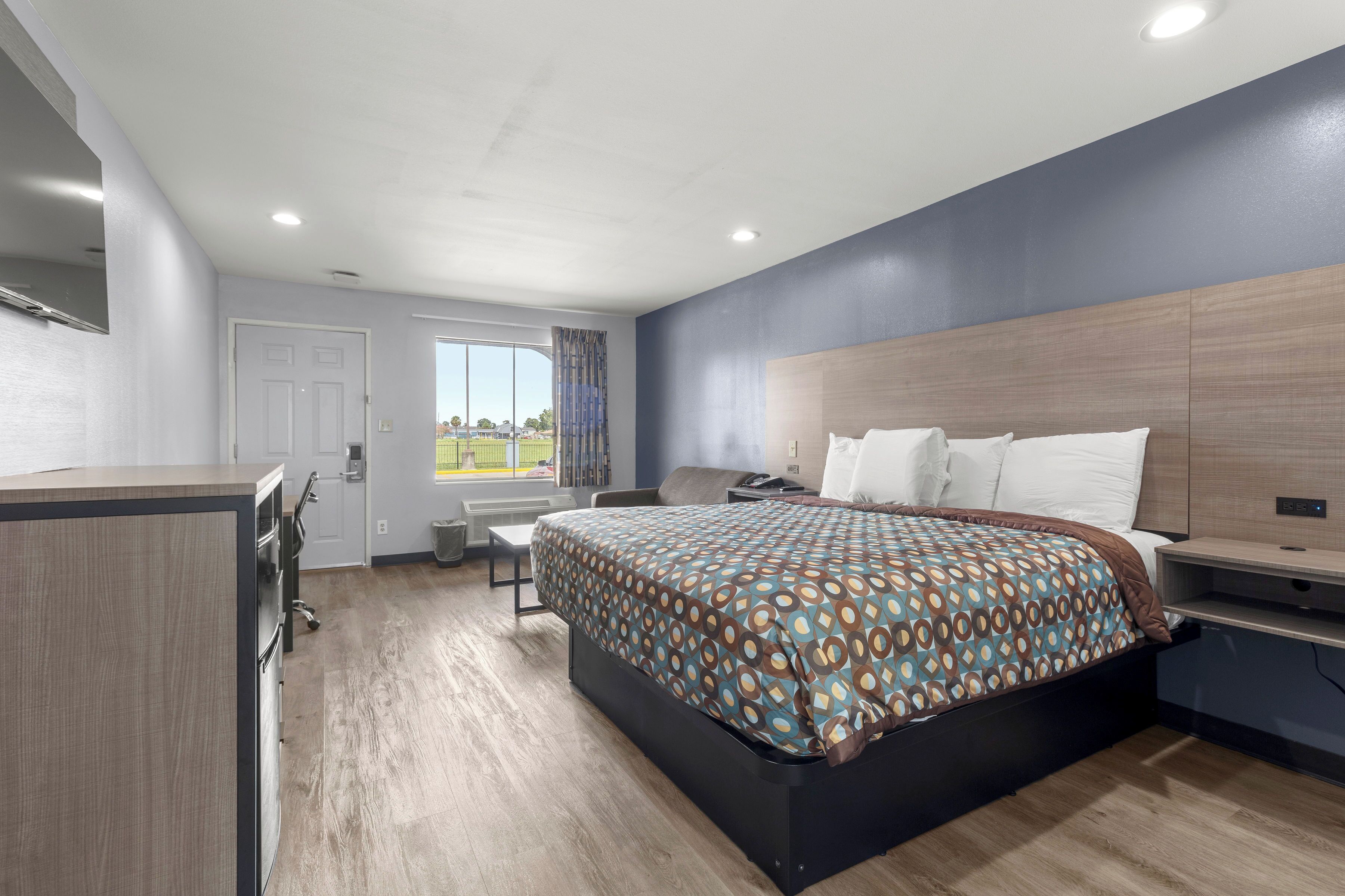 Desk, laptop workspace, blackout curtains, iron/ironing board