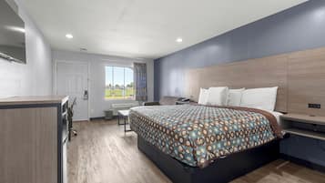 Desk, laptop workspace, blackout curtains, iron/ironing board