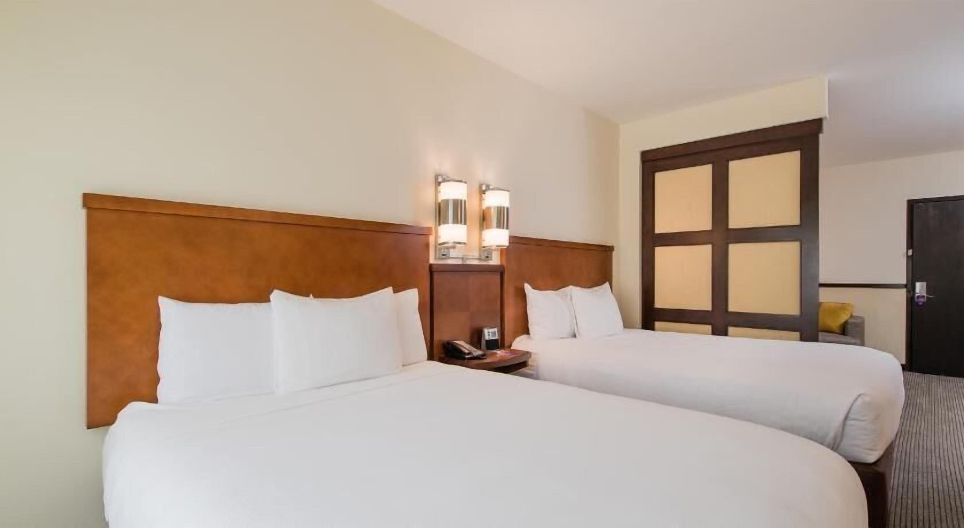 Premium bedding, pillow-top beds, in-room safe, desk