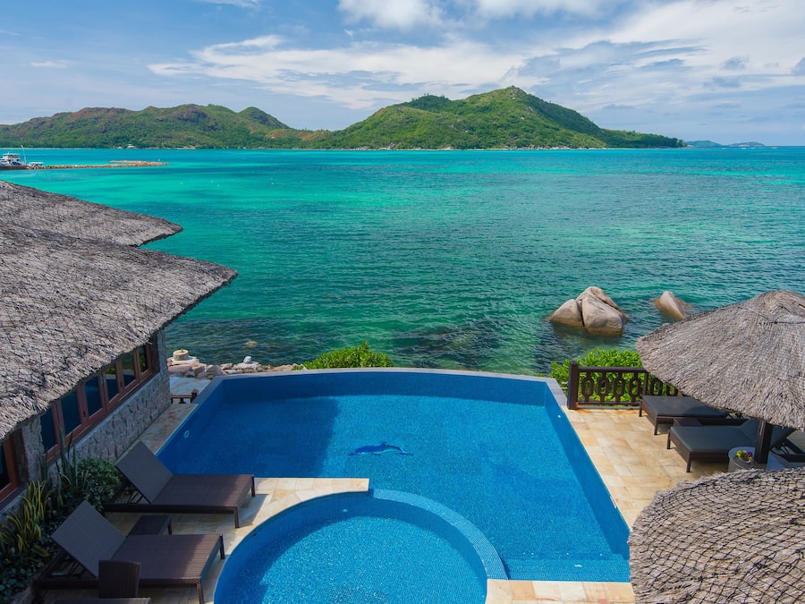 Outdoor pool, open 9:00 AM to 7:00 PM, pool umbrellas, sun loungers