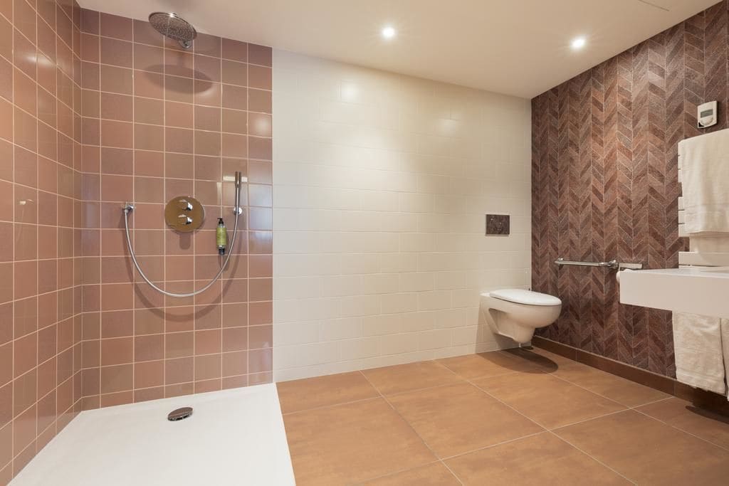 family room | bathroom | hair dryer, towels, soap, shampoo