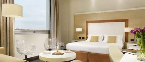 Deluxe Triple Room | Select Comfort beds, minibar, in-room safe, individually furnished