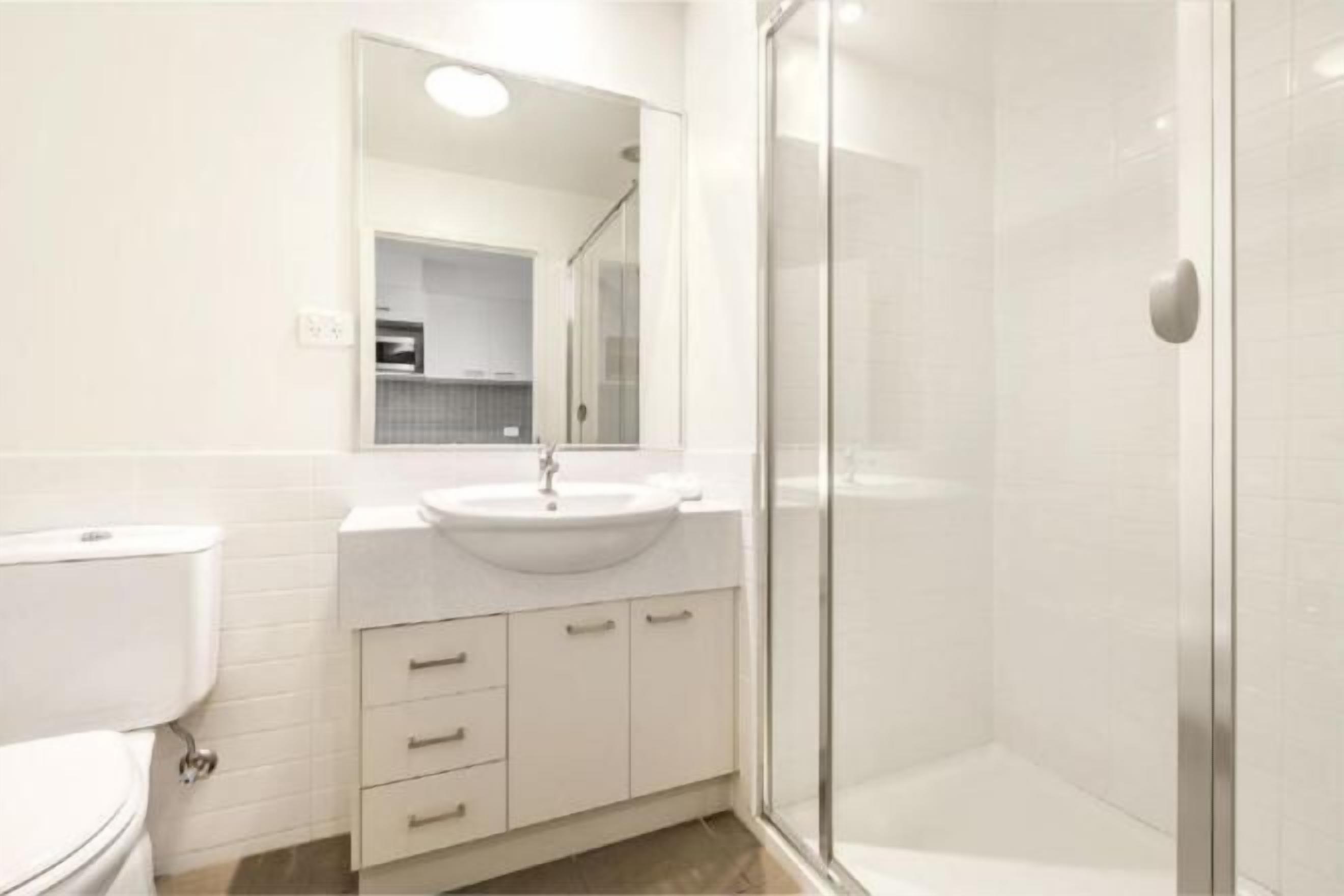 Bathroom | Designer toiletries, hair dryer, towels, soap