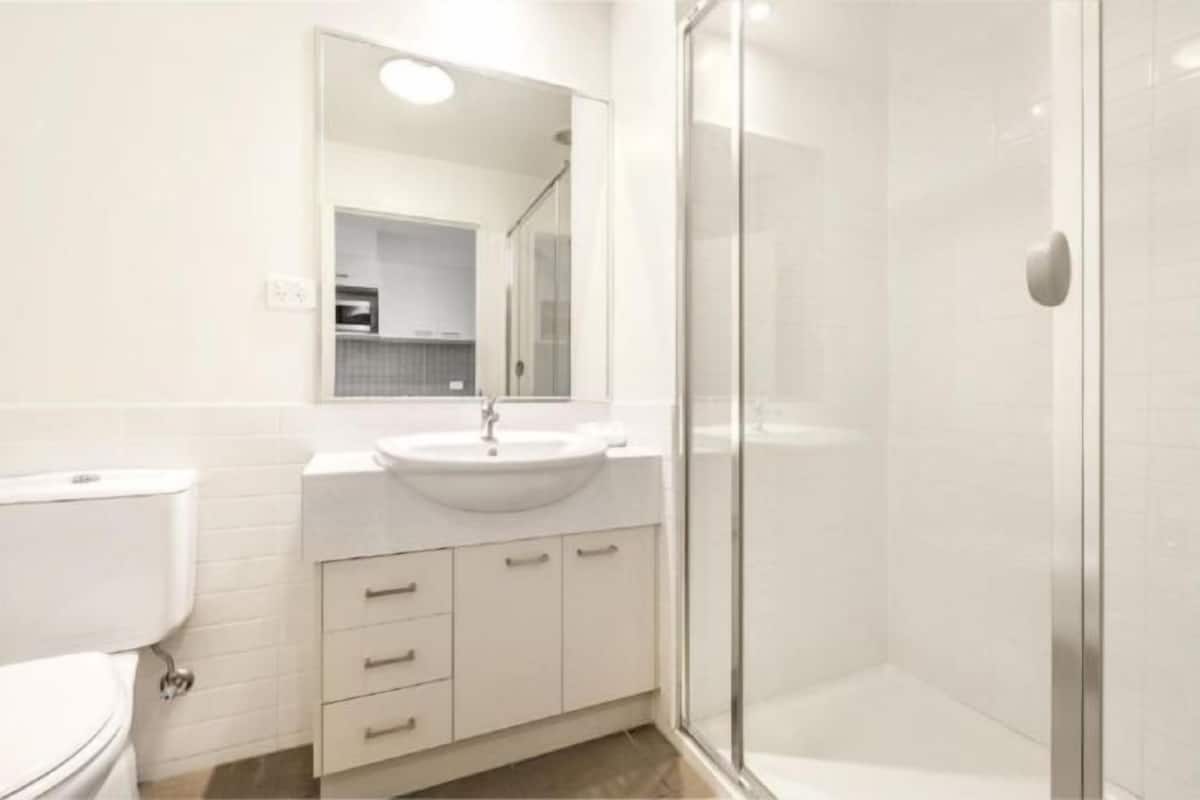 Bathroom | Designer toiletries, hair dryer, towels, soap